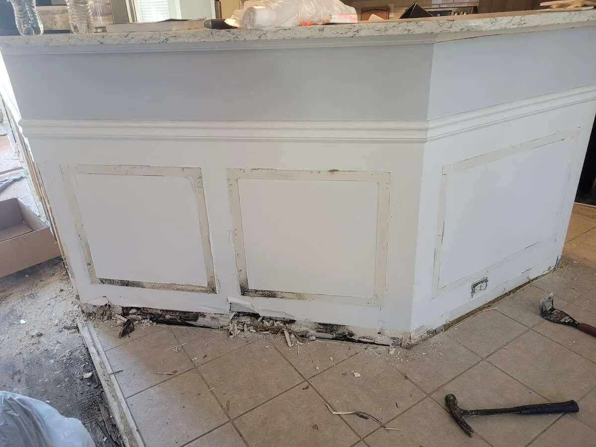 Water damage and mold on kitchen during Sewage Cleanup & Sanitation in Brigantine